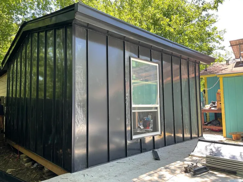 Black standing seam metal wall panels for Metal Roof Installation in Richmond Heights